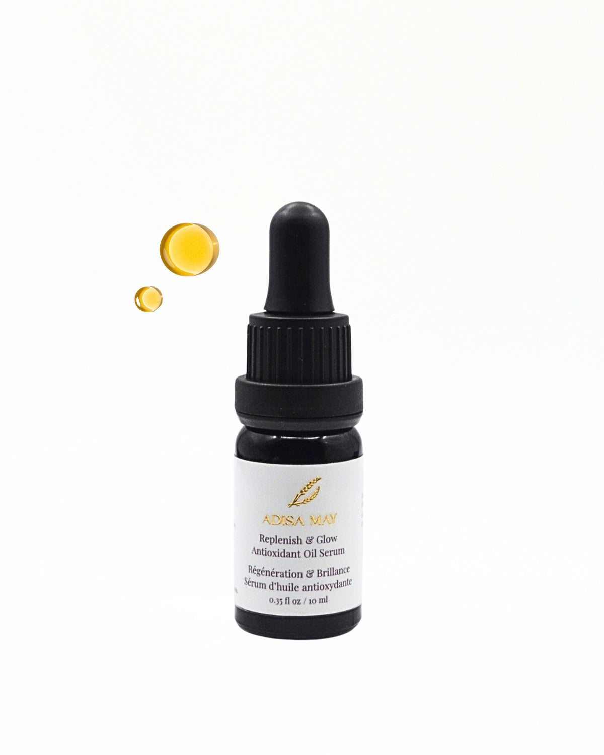 A small black dropper bottle labeled 'Addsa May Replenish & Glow Antioxidant Oil Serum' on a white background, with two floating golden oil droplets above it.
