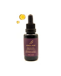 A 1 fl oz amber glass dropper bottle of Adisa May Replenish & Glow Antioxidant Oil Serum, featuring a dark purple label with gold lettering. Two floating droplets of golden oil are depicted above the bottle against a clean white background.