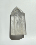 Clear crystal prism on a white background