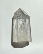 Clear crystal prism on a white background