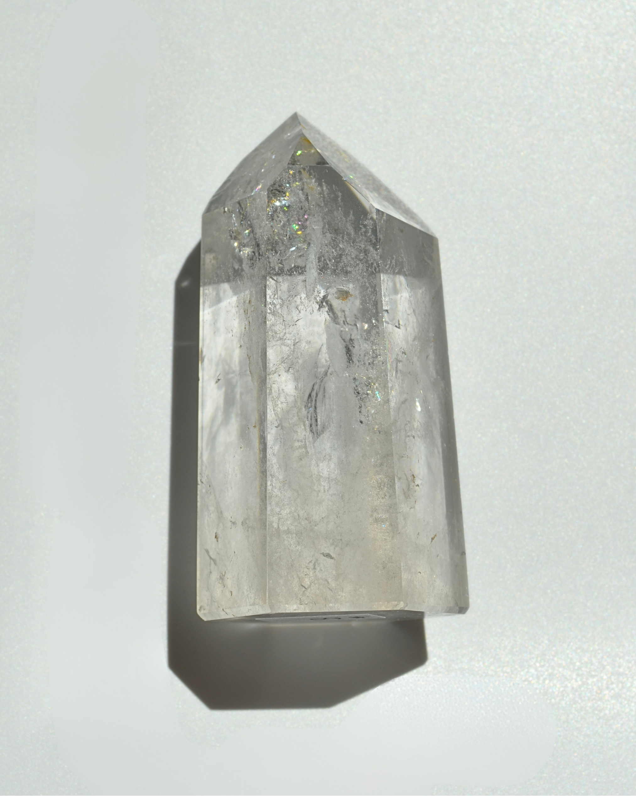 Clear crystal prism on a white background
