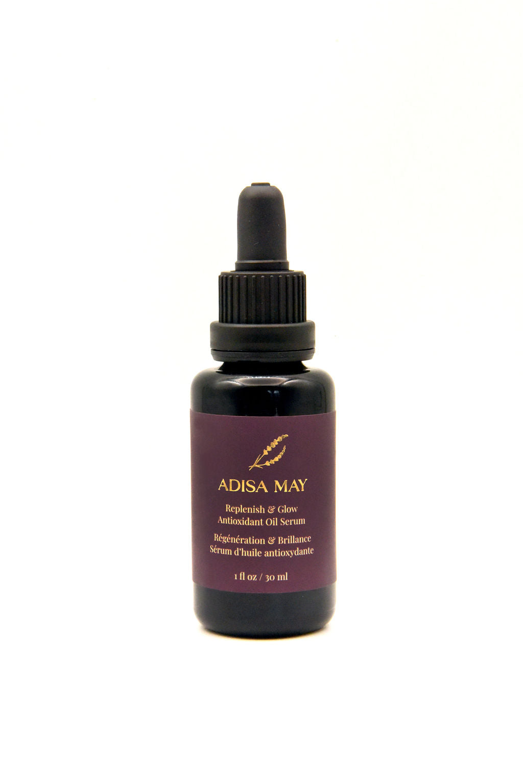 Adisa May skincare serum bottle with dropper on a white background