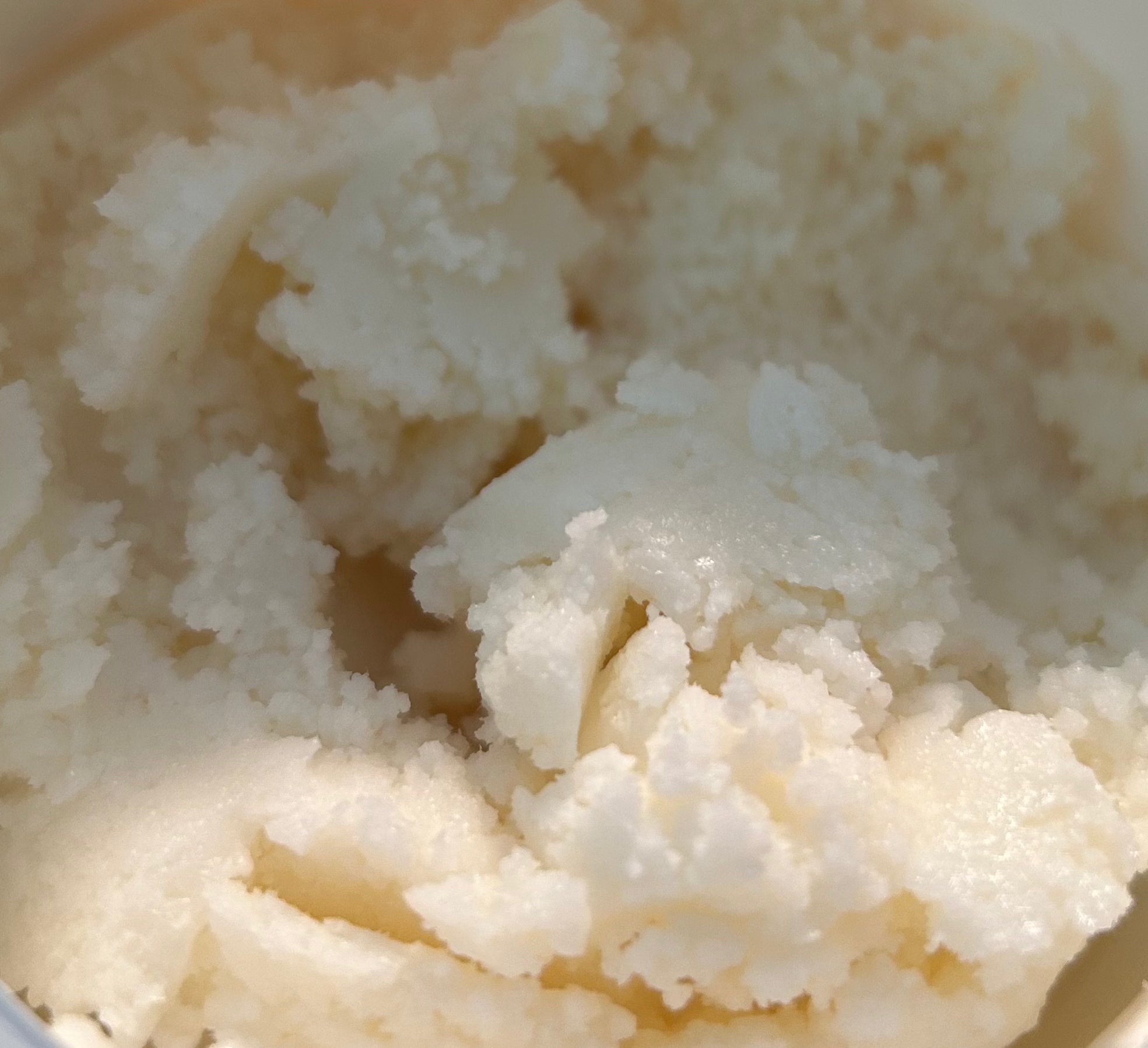 Close-up of a scoop of mango seed butter