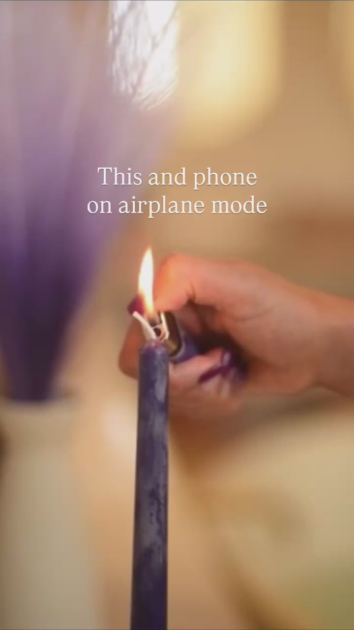 Adisa May Lighting Candle